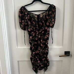 For love and lemons black ground floral mini dress with tie details